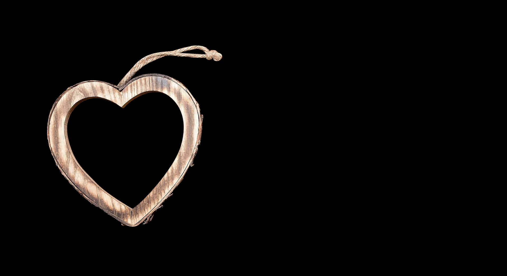 Wooden Heart Pendanton Black Background PNG Image