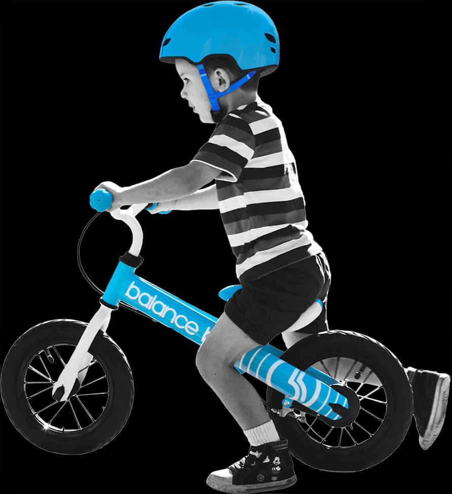 Young Boy Riding Balance Bike PNG Image