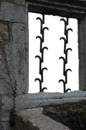 Ancient Stone Windowwith Iron Bars PNG Image