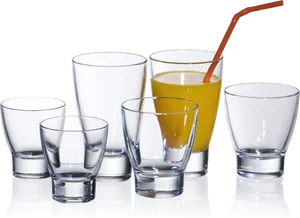 Assorted Glasses With Orange Juice PNG Image