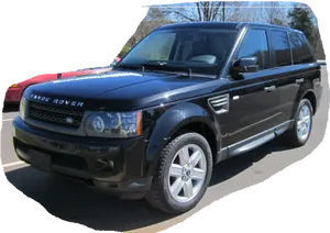 Black Land Rover S U V Parked Outdoors PNG Image