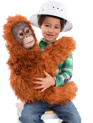 Boy With Plush Orangutan Toy PNG Image