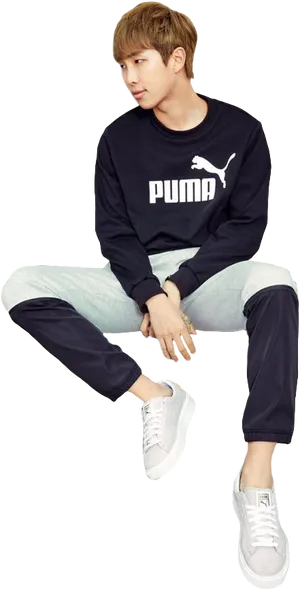 Casual Puma Outfit Sitting Pose PNG Image