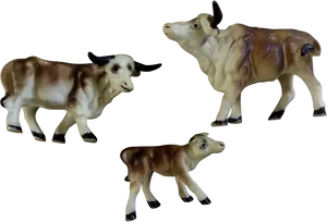 Ceramic Cowand Calves Figurines PNG Image