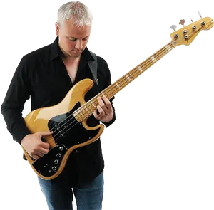 Focused Bass Guitarist Playing PNG Image