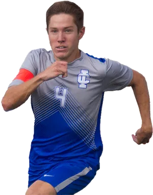 Focused Soccer Playerin Action PNG Image