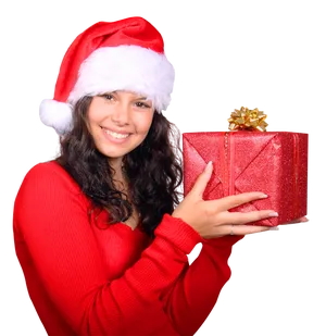 Girlin Santa Hatwith Christmas Gift PNG Image