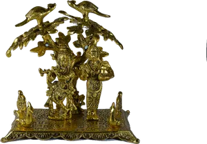 Golden_ Radha_ Krishna_ Statue_ Under_ Tree PNG Image