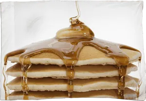 Golden Syrup Drizzleon Stackof Pancakes PNG Image