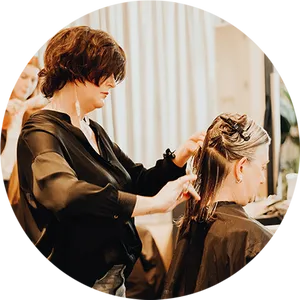 Hair Stylist At Work Salon Scene.jpg PNG Image