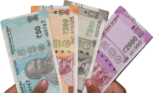 Indian Currency Notes Fanned In Hand PNG Image