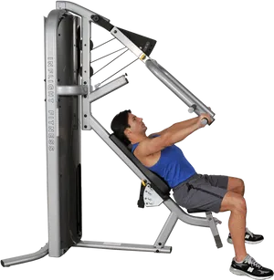 Man Using Chest Press Machineat Gym PNG Image