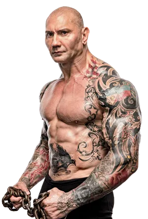 Muscular Tattooed Manwith Chains PNG Image