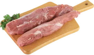 Raw Pork Tenderloinon Cutting Board PNG Image