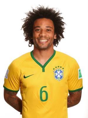 Smiling Soccer Playerin Yellow Jersey PNG Image