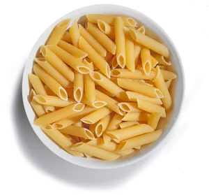 Uncooked Penne Pastain Bowl PNG