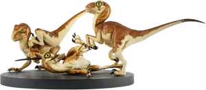 Velociraptors Statue Display PNG Image