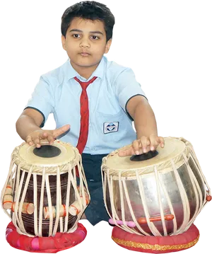 Young Boy Playing Tabla PNG Image