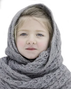 Young Girl Wrappedin Knit Scarf PNG Image